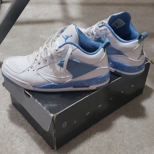 Baby blue and white Jordan Flight 45's